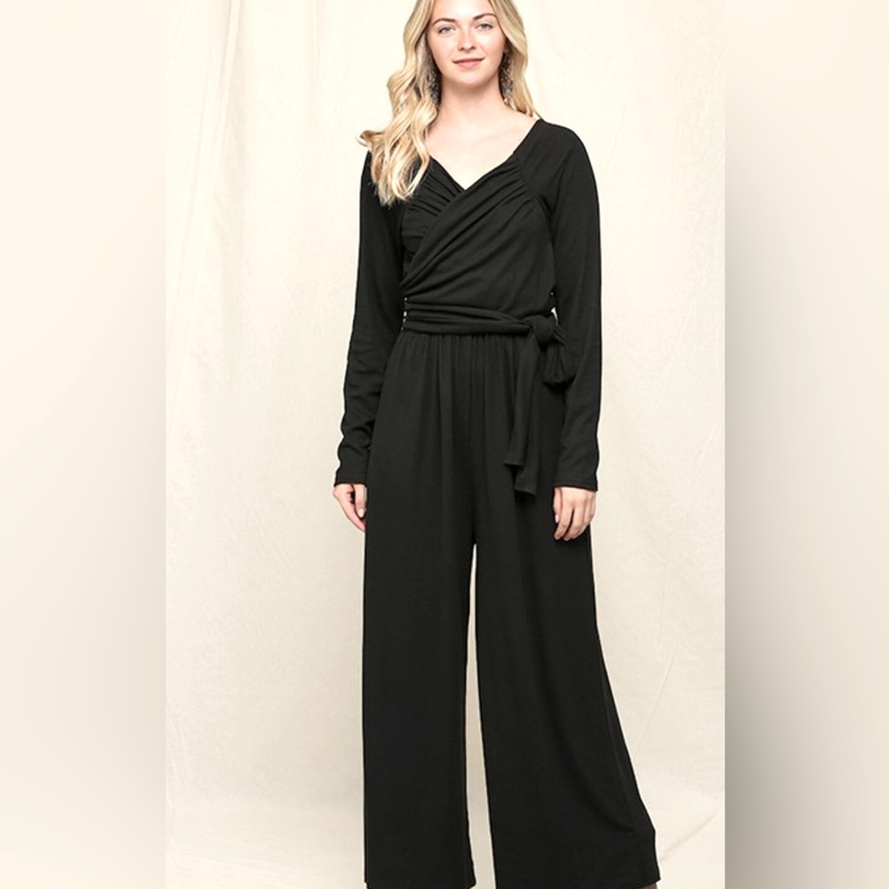 Black jumpsuit new with tags by Gigio